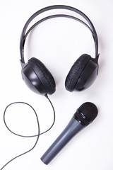 music concept - microphone and headphones over white