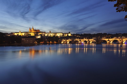 View over the River Vltava to Charles Bridge and the Castle District with St. Vitus Cathedral and Royal Palace, Prague, Bohemia, Czech Republic 