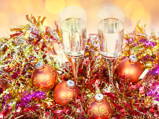 above view glasses, gold Xmass balls on tinsel