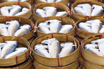 Steamed fish, Plaa Tuu (mackerel) in bamboo steamers at the seafood market