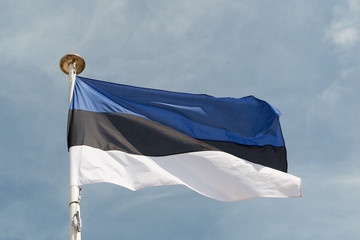Flag of Estonia under blue sky