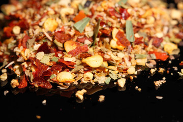 Piri Piri.
Pile of Piri Piri on a black surface.