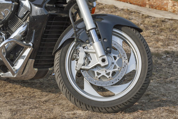 motorbike front wheel with brake system closeup