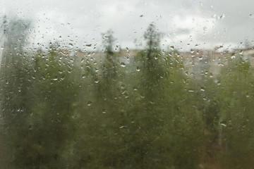 Raindrops on glass. Sorrow.