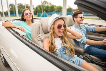 Friends in cabriolet