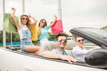 Friends in cabriolet