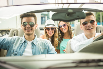 Friends in cabriolet