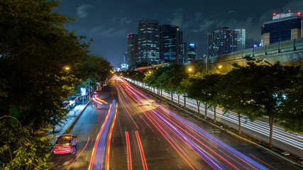 Fototapeta premium Night view of Bangkok with traffic trails