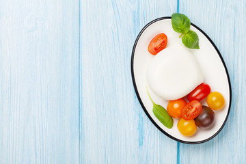 Mozzarella, tomatoes and basil