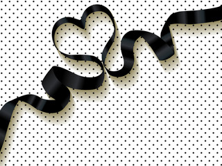 Black ribbon on a polka dots background. © AllebaziB