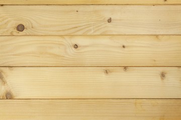 Fototapeta premium Wooden background for your text. Wood as a background for a collage. Detail on a wooden board. 