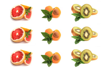 grapefruit,apricot, slices of ripe kiwi with mint leaves on a wh
