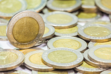 Coins of Thailand. Wat Arun Temple in Bangkok, Thailand, depicted in the Thai ten baht coin.