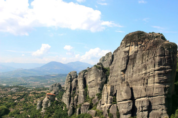 Fototapeta na wymiar Monastery in the mountains. View of the mountain valley