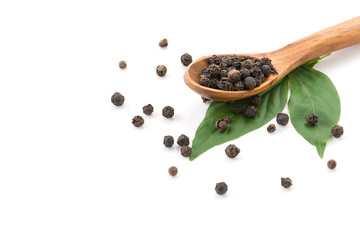 Black pepper with wood spoon