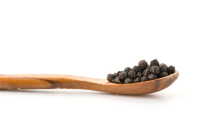 Black pepper with wood spoon