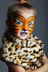 little girl with tiger costume