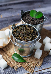 Dry leaves of black and green tea