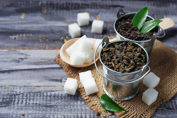 Dry leaves of black and green tea