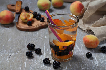 Detox water with peach and blackberry