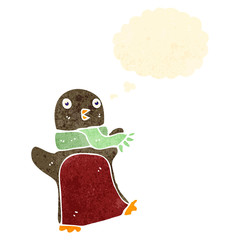 retro cartoon christmas robin with thought bubble