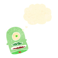 retro cartoon alien monster face