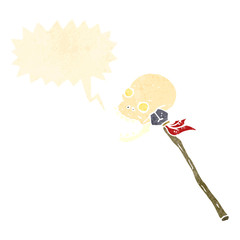 retro cartoon skull on spear