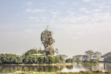 small pagodas on a steep rock