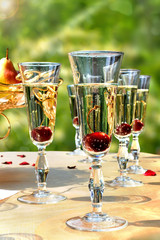 glasses of cocktails with cherries