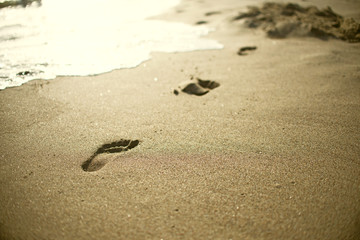 beach, wave and footsteps