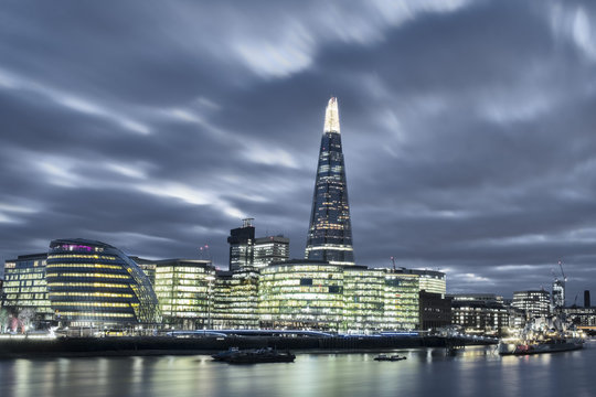 The Thames in Southwark with City Hall, More London Riverside, both architect Norman Foster, the Shard, architect Renzo Piano, and HMS Belfast, London