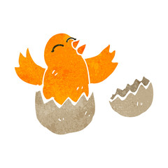 retro cartoon bird hatching from egg