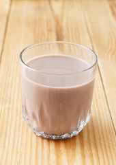 glass of chocolate milkshake on the table