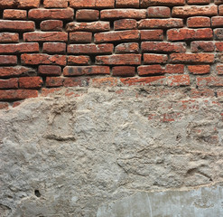 Fototapeta premium cracked concrete vintage brick wall background