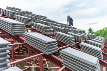 labor working in construction site for roof