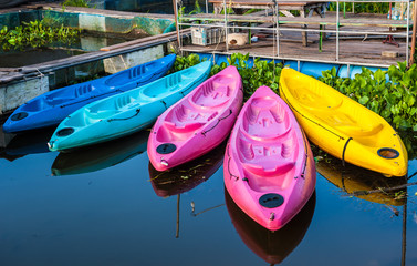 Kayaks in river Colorful plastic boat..