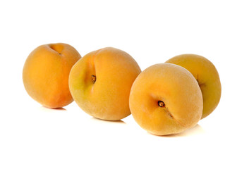 ripe peach on white background