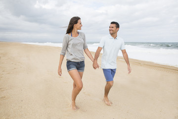 portrait of living young couple at the beach