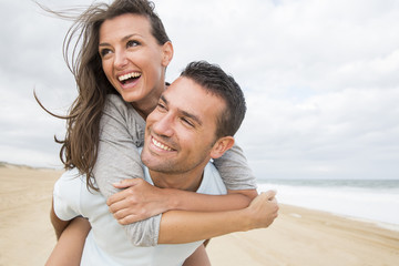 portrait of living young couple at the beach