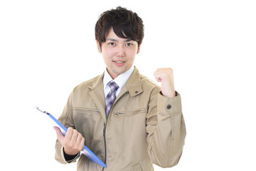 ガッツポーズの作業員