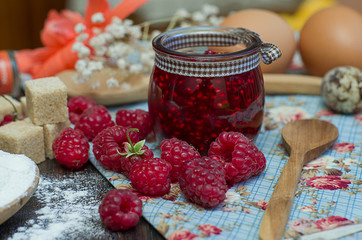 delicious homemade raspberry jam in a glass jar