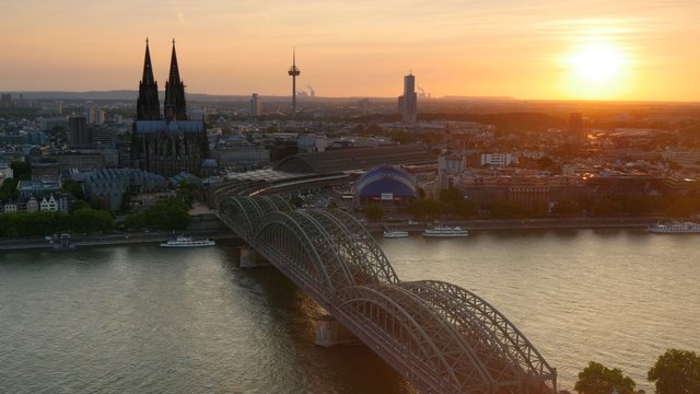 Cathedral and Hohenzollern Bridge. Cologne, Germany. UHD, 4K