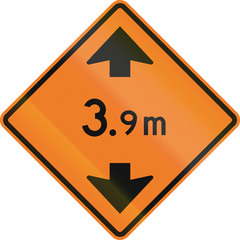 Roadworks sign in Canada - Height limit ahead. This sign is used in Ontario