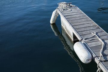 Small floating pier for yachts mooring