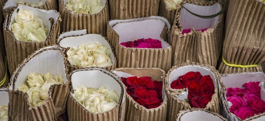 Roses wrapped with brown paper