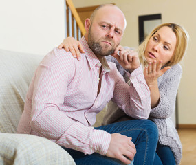 Woman consoling sad men