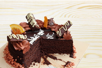 Chocolate cake on wooden background