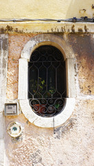 oval shape window of old house