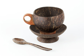 Coconut Peel wooden cup of coffee and spoon