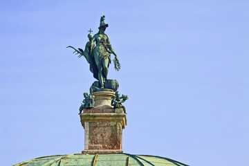 Fototapeta na wymiar Munich, Germany - Hofgarten round pavillon, detail of the bronze statue of Bavaria on top